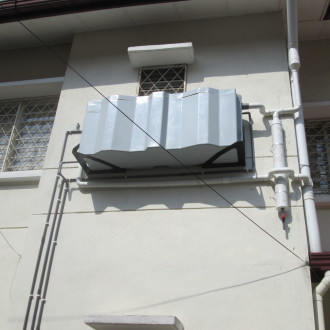 Sistem Penuaian Air Hujan Yang Tidak Menguna Pam Elektrik